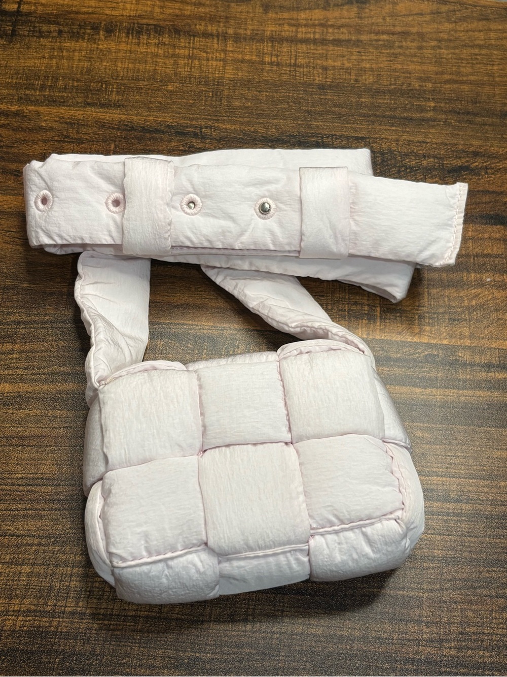 Light pink Bottega Veneta Cassette crossbody bag puffy woven nylon intrecciato